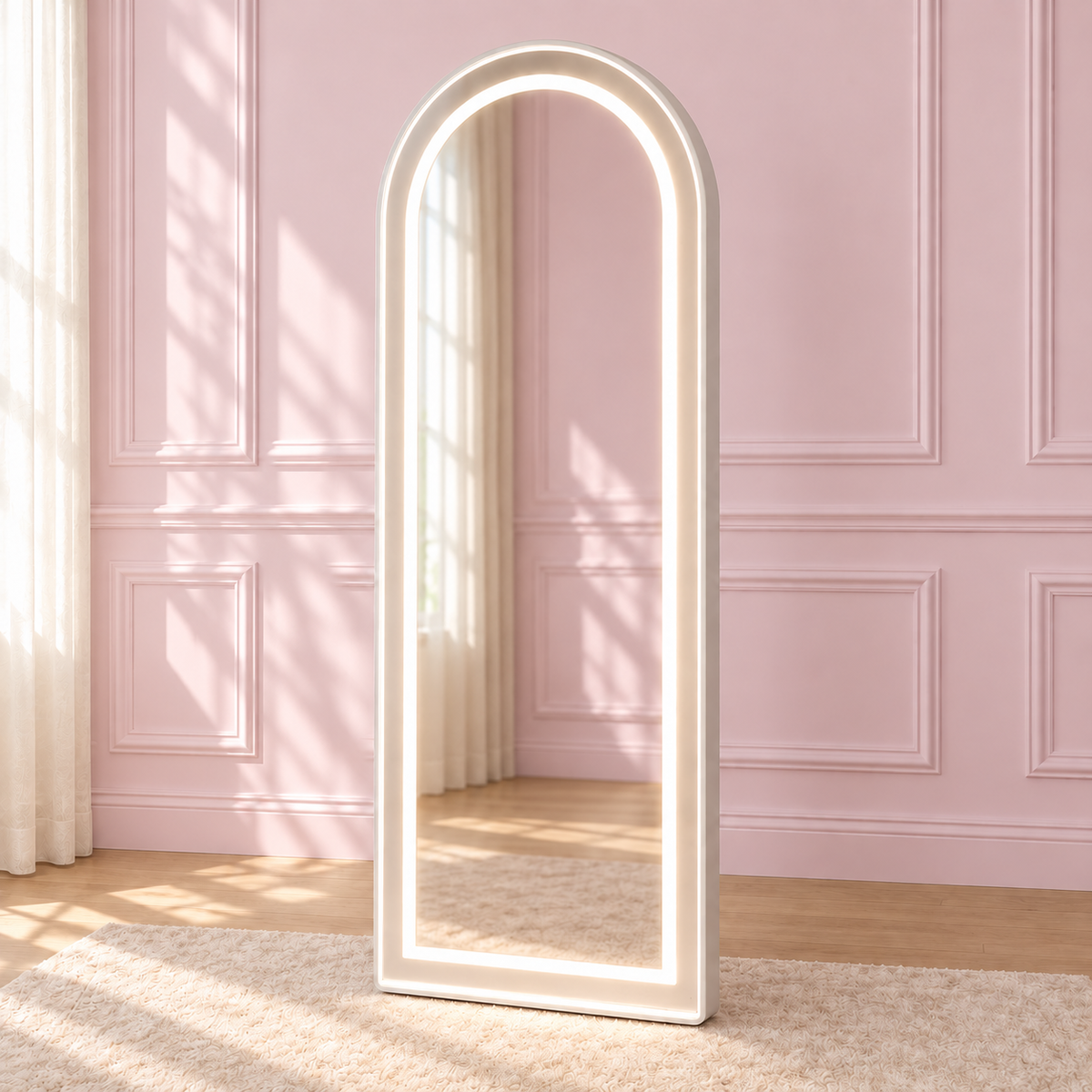 Aries Arch Floor Mirror in a soft blush pink setting