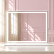 The Nova Mirror in a soft blush pink setting