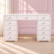 White Mini Dollface Vanity with solid white top and clear faceted crystal drawer knobs in a blush pink room.
