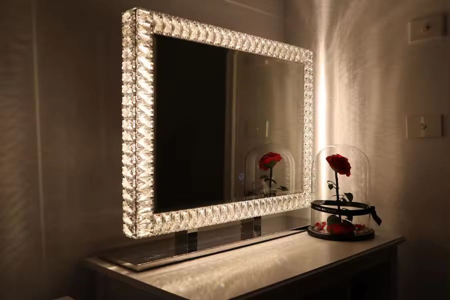Premium Angel Magic Diamond mirror in Australia with a sparkling diamond-encrusted frame, soft dimmable LED lighting and three light settings for luxury makeup vanities and beauty rooms by Vanity Vault.