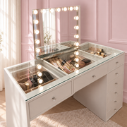 Apartment makeup vanity with a compact 120cm design, flush glass top, built-in storage compartments and spacious drawers for organised beauty routines.