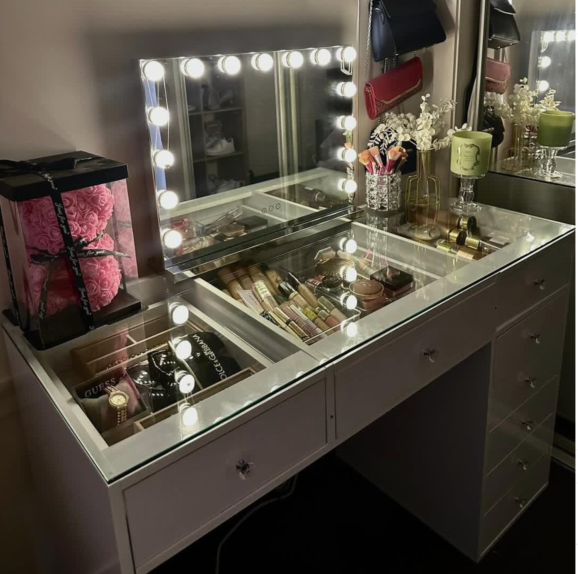 Apartment makeup vanity with a compact 120cm design, flush glass top, built-in storage compartments and spacious drawers for organised beauty routines.