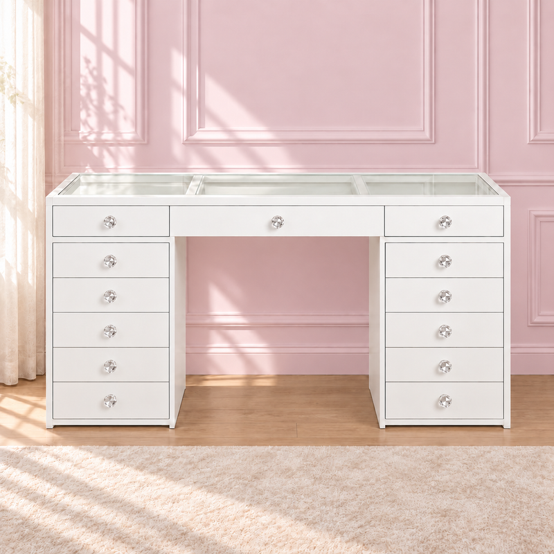 The Babyface Vanity in a soft blush pink setting — with clear faceted crystal drawer knobs.