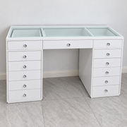 Babyface white vanity desk with glass top, thirteen drawers and crystal-style knobs