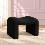 Black Willow Curve vanity stool with textured bouclé fabric and sculptural curved design for makeup desks and beauty rooms.