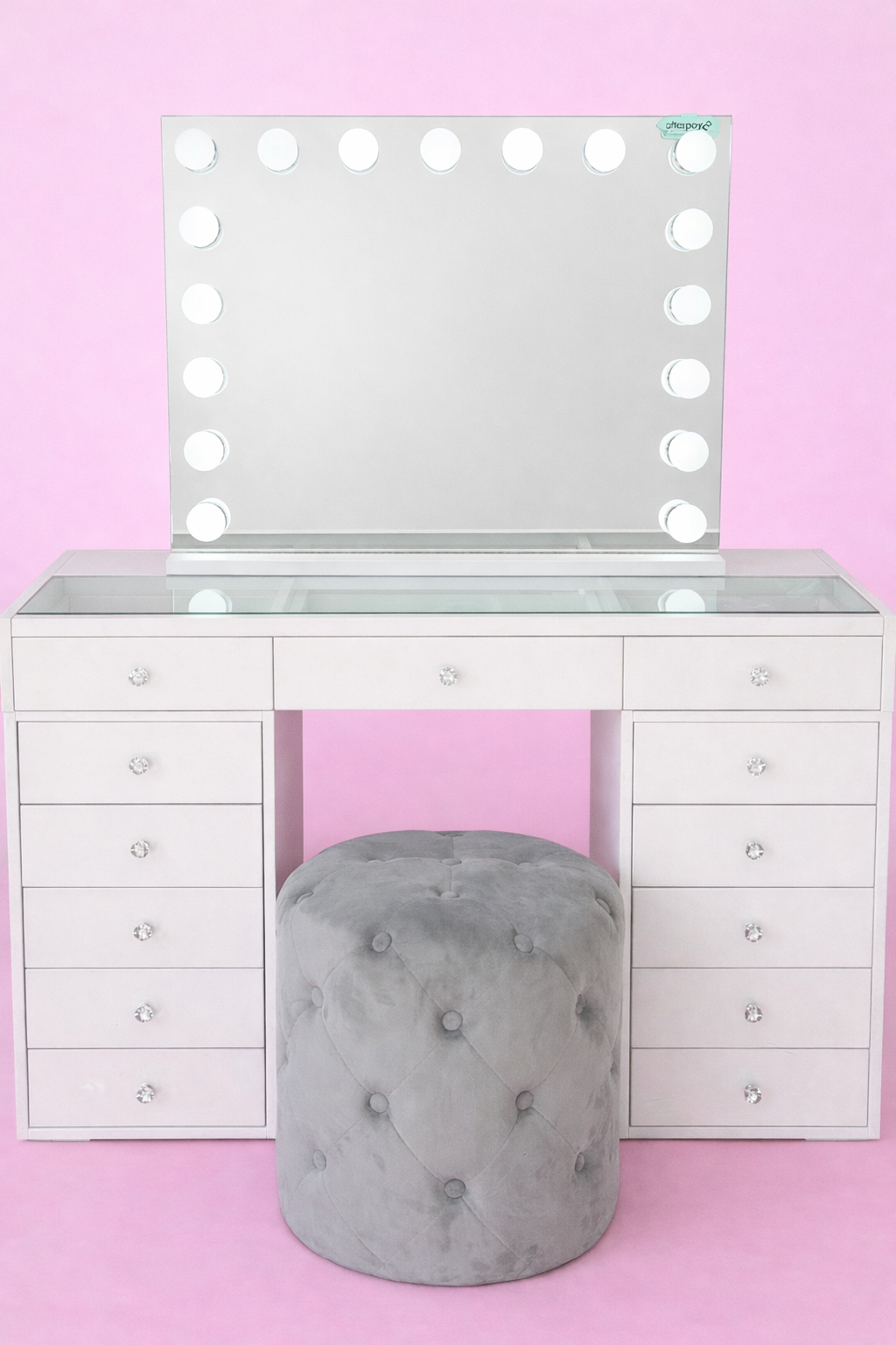 Compact makeup vanity package with the Mini Dollface Vanity, Seraphina LED Hollywood Mirror and matching Marshmellow Ottoman, ideal for bedrooms, apartments and beauty rooms.