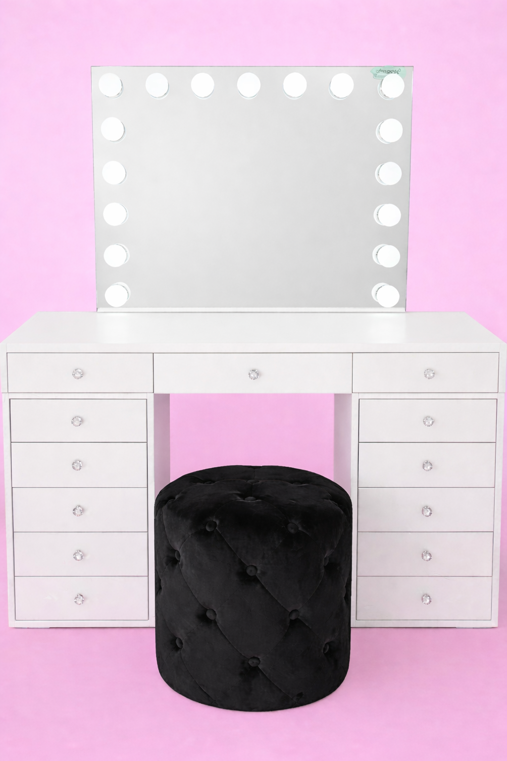 Compact makeup vanity with Hollywood mirror featuring the Mini Dollface Vanity, Seraphina LED mirror and matching Marshmellow Ottoman for small bedrooms and apartments.