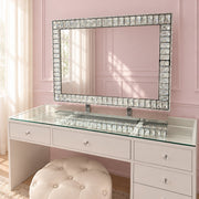 Crystal vanity mirror with soft LED lighting, a sparkling diamond-encrusted frame and elegant mirrored base for makeup vanities, dressing rooms and bedrooms.