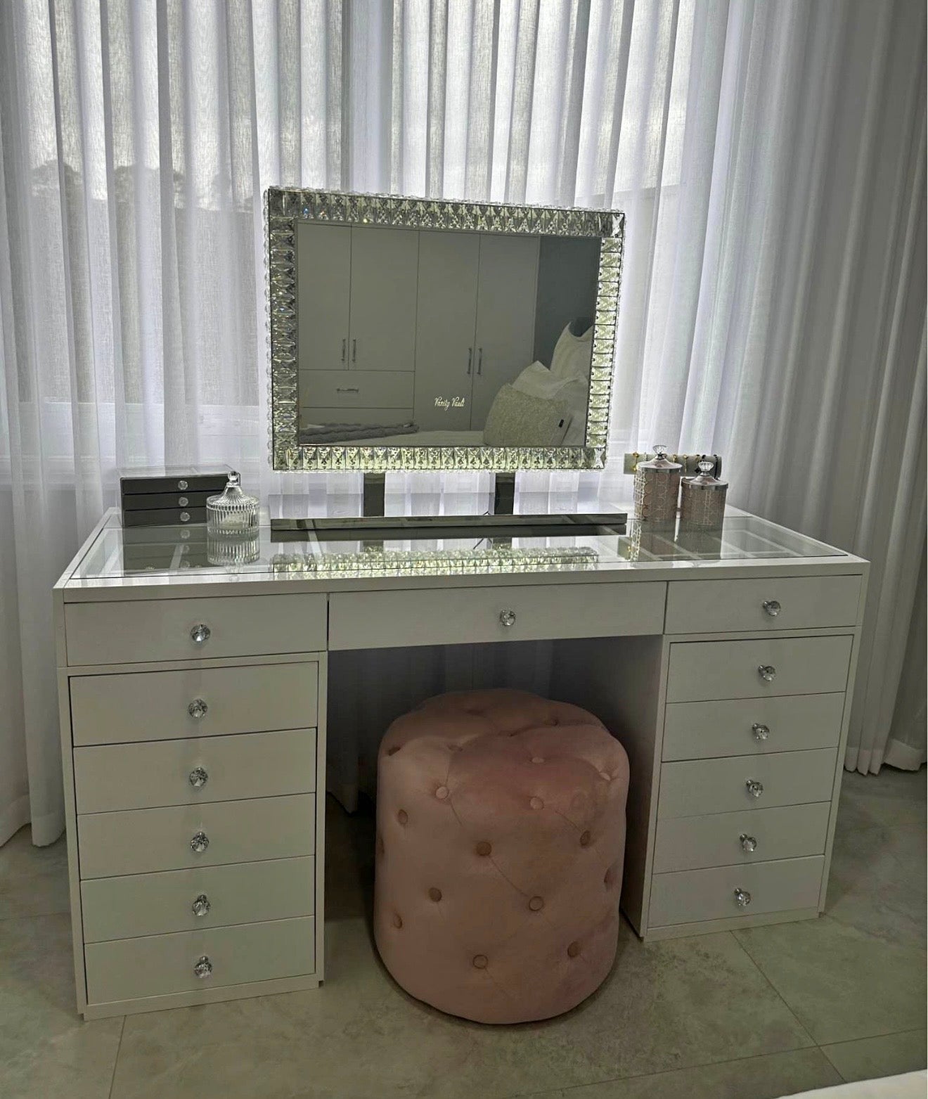 Diamond-framed LED mirror with soft ambient lighting, touch controls and a luxury crystal-inspired design for dressing tables and makeup vanities.