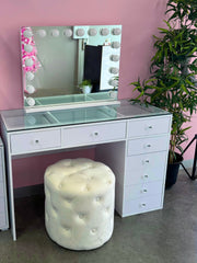 Essentials Collection Mini Edition compact makeup vanity package featuring a Mini Vanity Desk, Seraphina LED Hollywood Mirror and Marshmellow Ottoman for stylish bedrooms, apartments and beauty rooms by Vanity Vault.