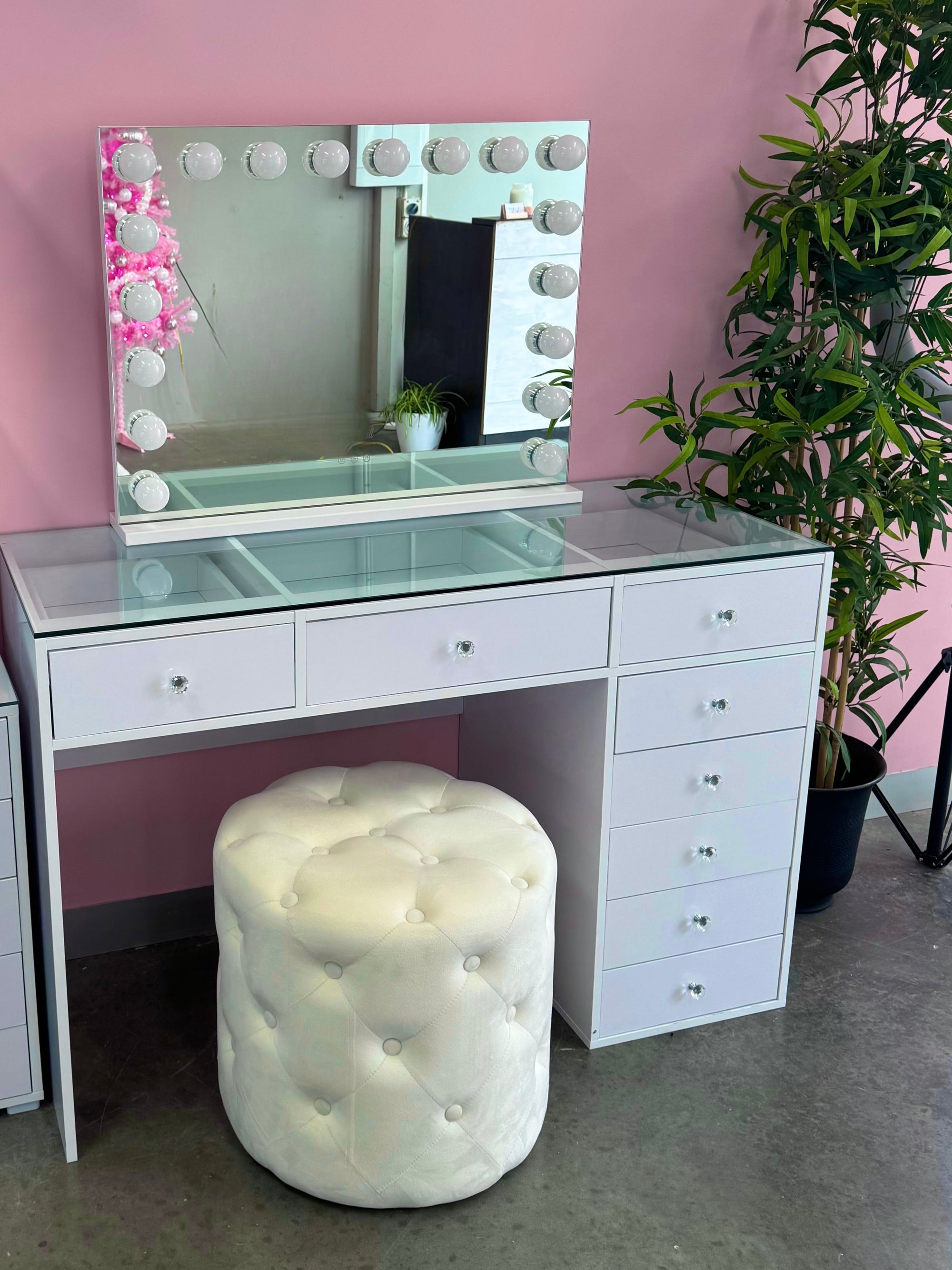 Essentials Collection Mini Edition compact makeup vanity package featuring a Mini Vanity Desk, Seraphina LED Hollywood Mirror and Marshmellow Ottoman for stylish bedrooms, apartments and beauty rooms by Vanity Vault.