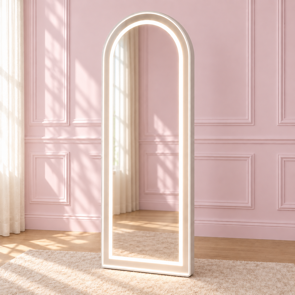 Aries Arch Floor Mirror in a soft blush pink setting