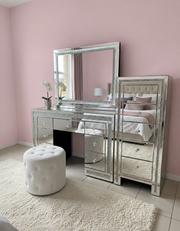 Glam mirrored beauty room furniture featuring the Winter Whisper vanity, illuminated mirror and matching seat with sparkling crushed crystal accents and elegant mirrored finishes.