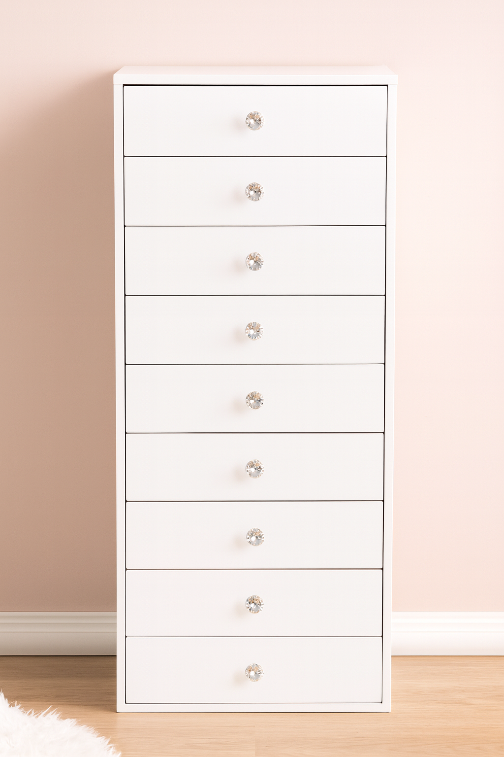 Harmony 9 Tower makeup storage cabinet with a high-gloss white finish, 9 spacious drawers, crystal-style knobs and a slim space-saving design for makeup, skincare and beauty storage by Vanity Vault.