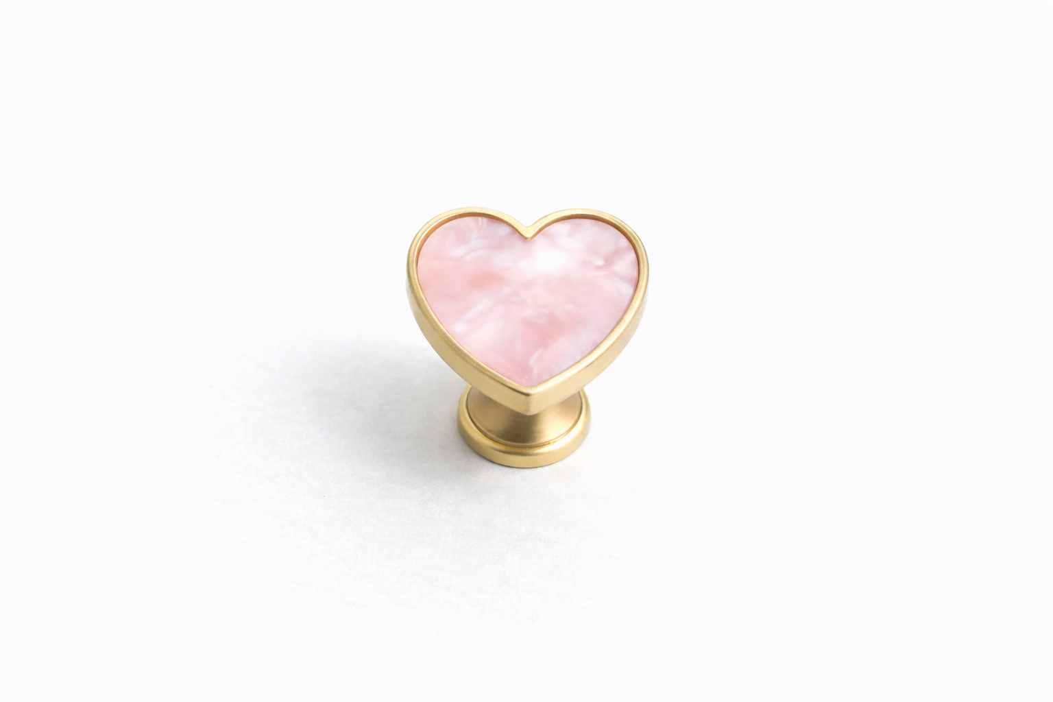 Heart Stone Vanity Knob with a textured stone-effect heart design and brushed gold zinc alloy frame, perfect for vanities, dressers, drawers and cabinets by Vanity Vault.