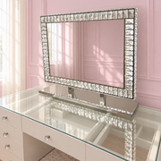 Luxury diamond Hollywood mirror with sparkling crystal detailing, soft LED illumination and an elegant mirrored base for glamorous makeup stations and beauty rooms.