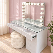 Mini makeup vanity with built-in storage compartments, smooth-glide drawers, a flush glass top and a premium high-gloss finish for compact beauty spaces.