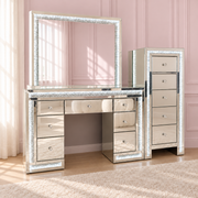 Luxury mirrored LED tallboy with crushed crystal trim, crystal drawer knobs and spacious storage drawers for glamorous bedrooms and dressing rooms.
