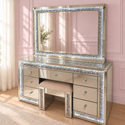 Luxury mirrored LED makeup mirror with crushed crystal detailing, soft LED lighting and a glamorous mirrored frame for dressing tables and beauty rooms.