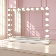 The Luna Luxe Mirror in a soft blush pink setting