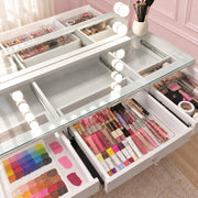 Small glass top dressing table with a premium high-gloss finish, built-in storage compartments and crystal-style drawer knobs for modern bedrooms and beauty rooms.
