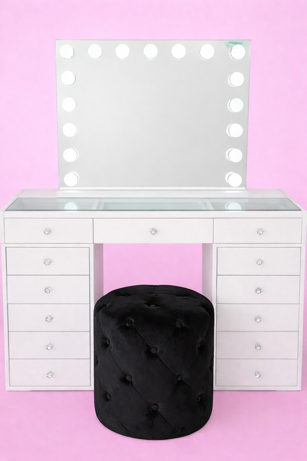 Small white makeup vanity package with LED Hollywood mirror, cushioned vanity stool and spacious drawer storage for modern beauty rooms and dressing tables.