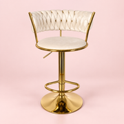 The Sitting Pretty Makeup Stool in white velvet with a gold base