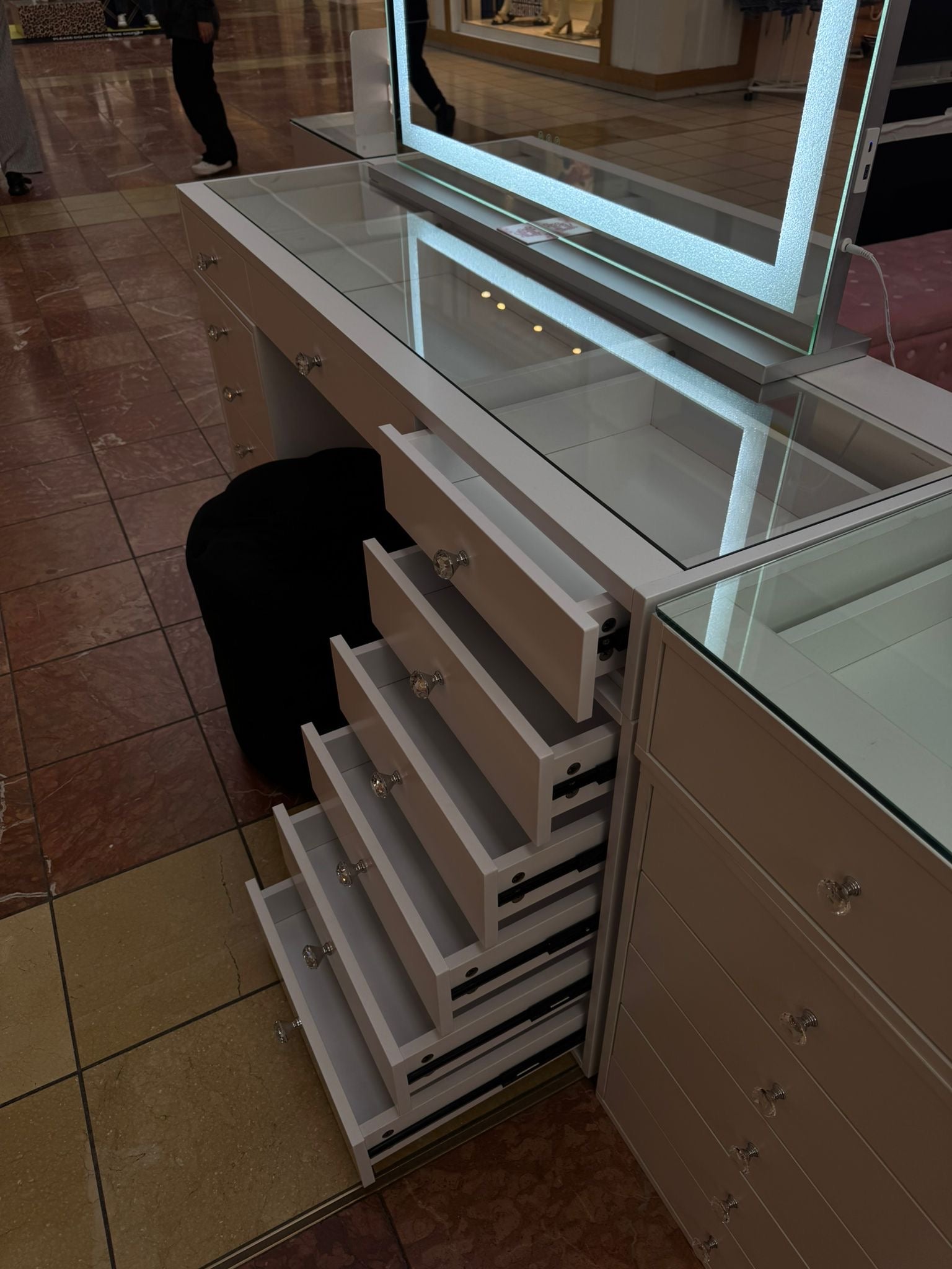 White dressing table with a choice of glass or solid white top, spacious storage drawers and a modern high-gloss finish for stylish beauty rooms and bedrooms.